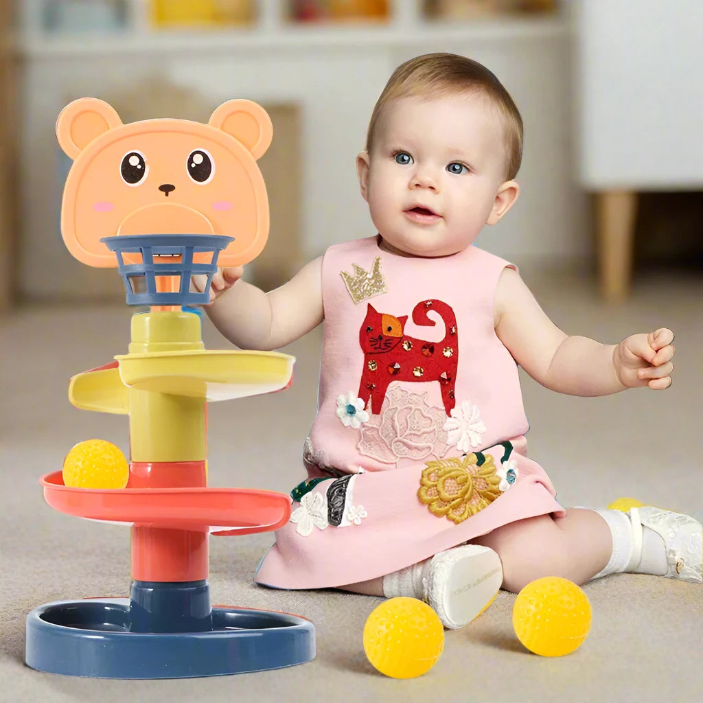 baby on ground playing with developmental toy