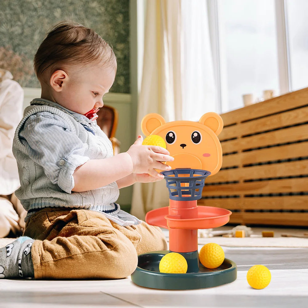 Baby Putting ball into net and slide